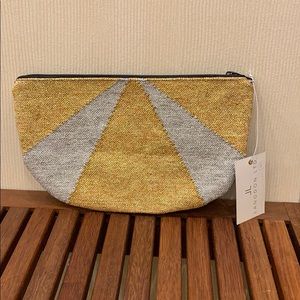 Silver and gold clutch